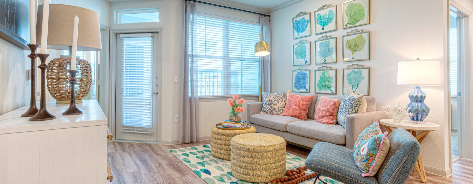 a living room with a rug and a couch