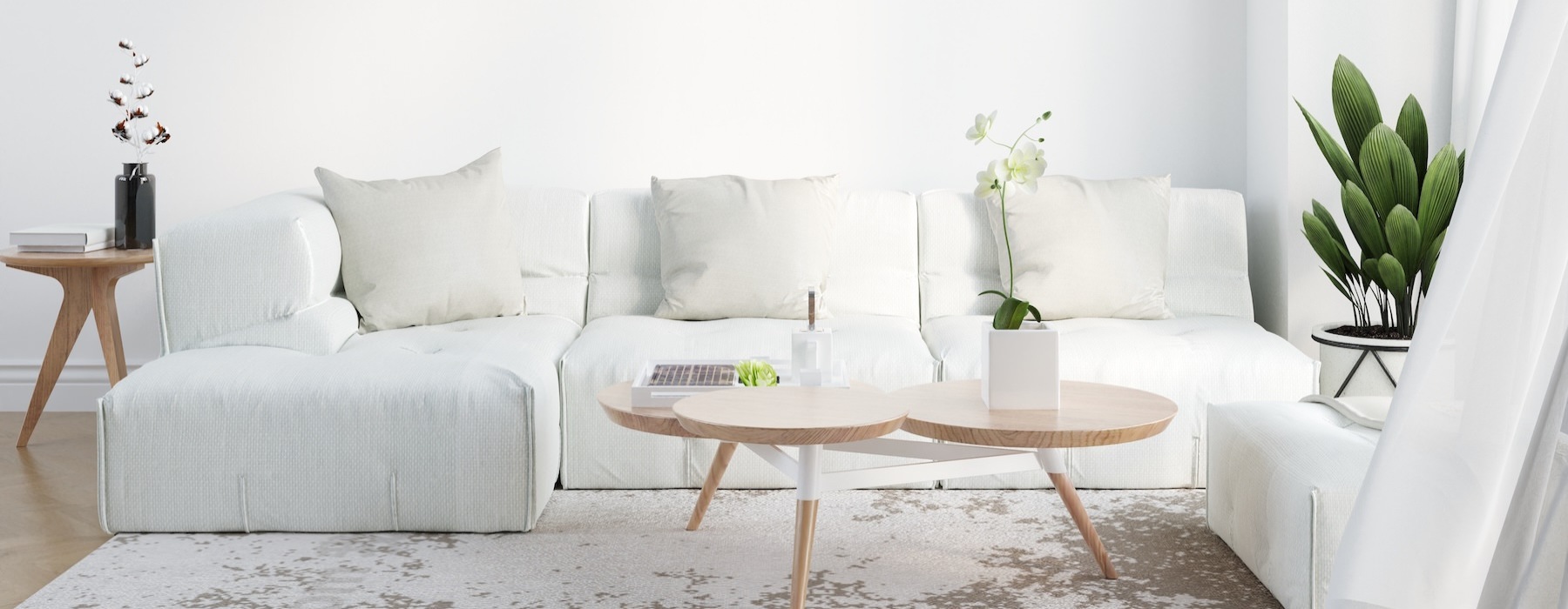 a white couch with a coffee table