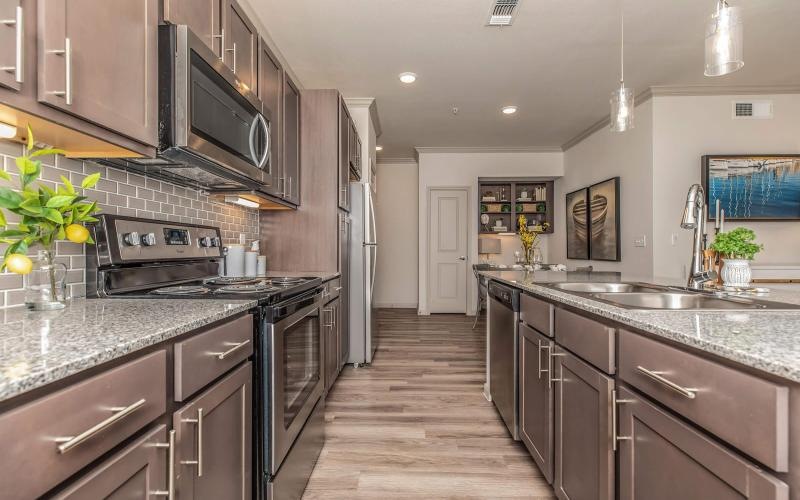 a kitchen with stainless steel appliances